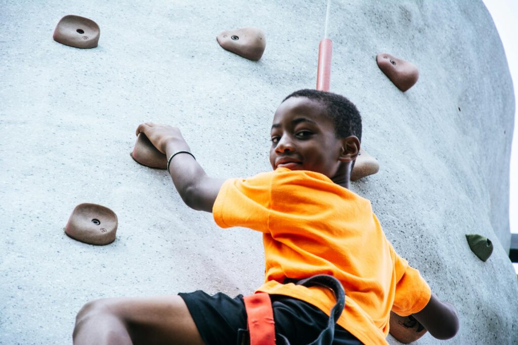 A climbing wall with a child