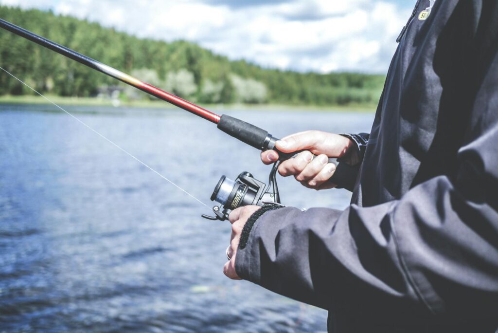 A person fishing on a lake